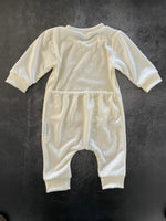 Load image into Gallery viewer, Flat lay view of a merino onsies with cuffs at the ankles
